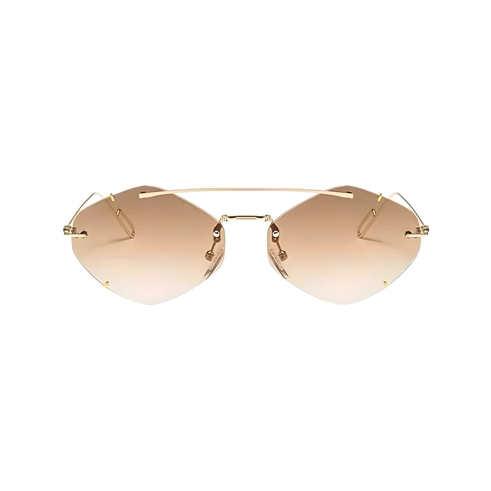 Minimal round sunglasses with gold frame and brown polarized lenses, front view — HARO Cap d'Antibes