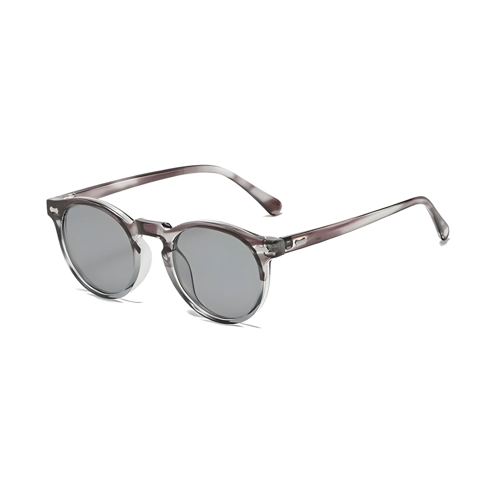 Round sunglasses with translucent gray frame and smoky lenses, side angle — HARO Ravello Infinity
