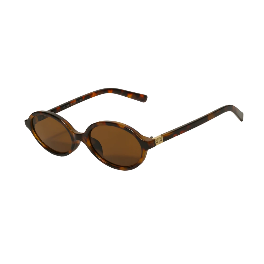 Oval acetate sunglasses with tortoise frame and brown lenses, side angle — HARO Anacapri Terrazza